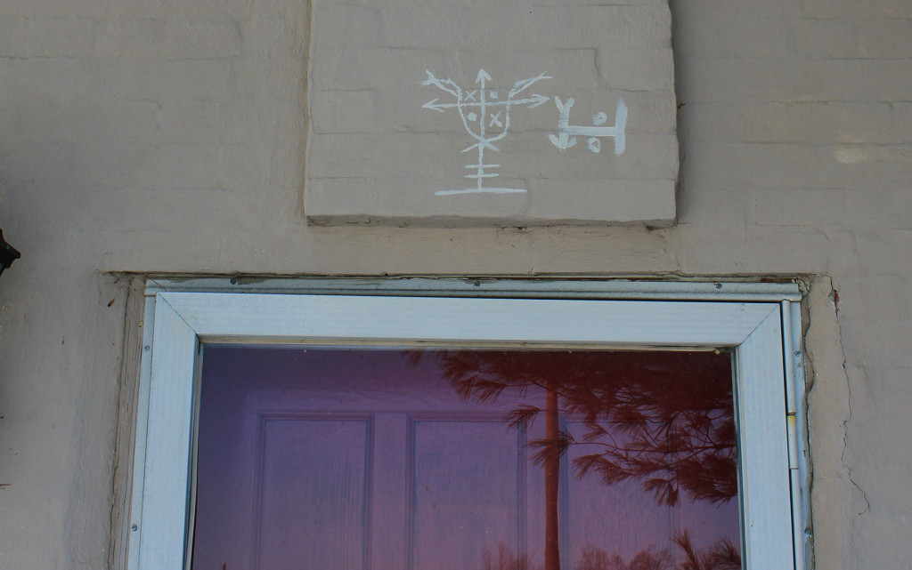 Symbols Above Front Door